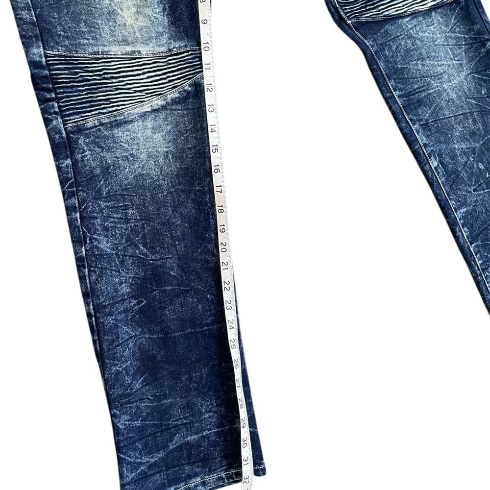 Blue Bootcut Jeans with Distressed Details